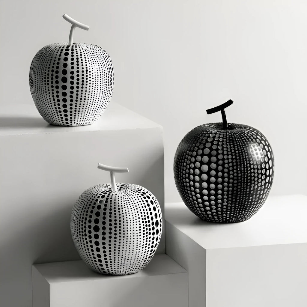 Resin apple sculpture in black, 17cm tall, smooth resin finish