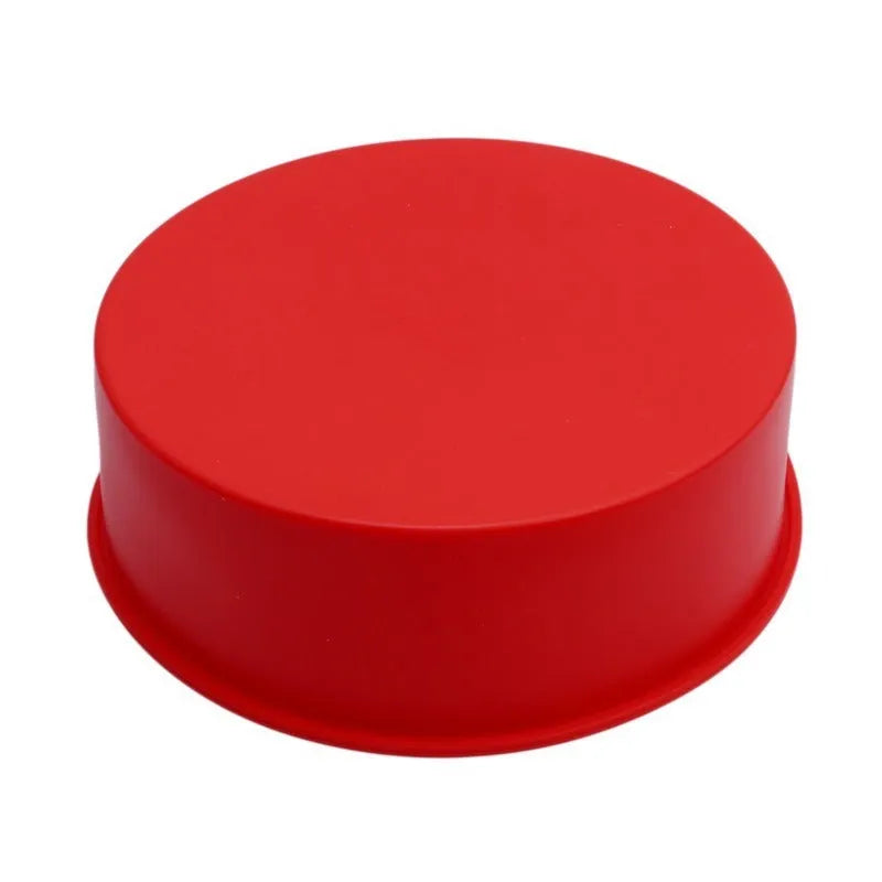 Set of three red round silicone cake baking moulds in 4-inch, 6-inch, and 8-inch sizes.