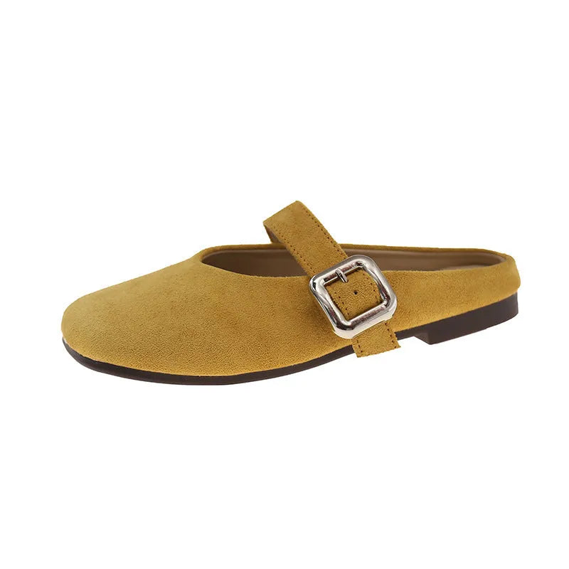 Women's flat apricot coloured slippers with a square toe, PU leather upper, and a dark rubber sole.