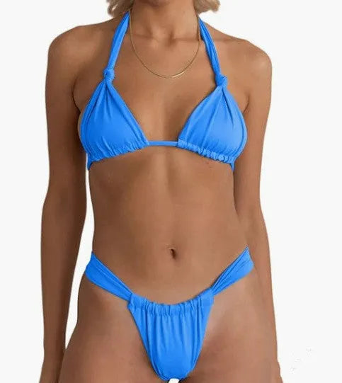 Women's solid colour bikini with pleated straps and a knot-tie front, shown in peacock green.