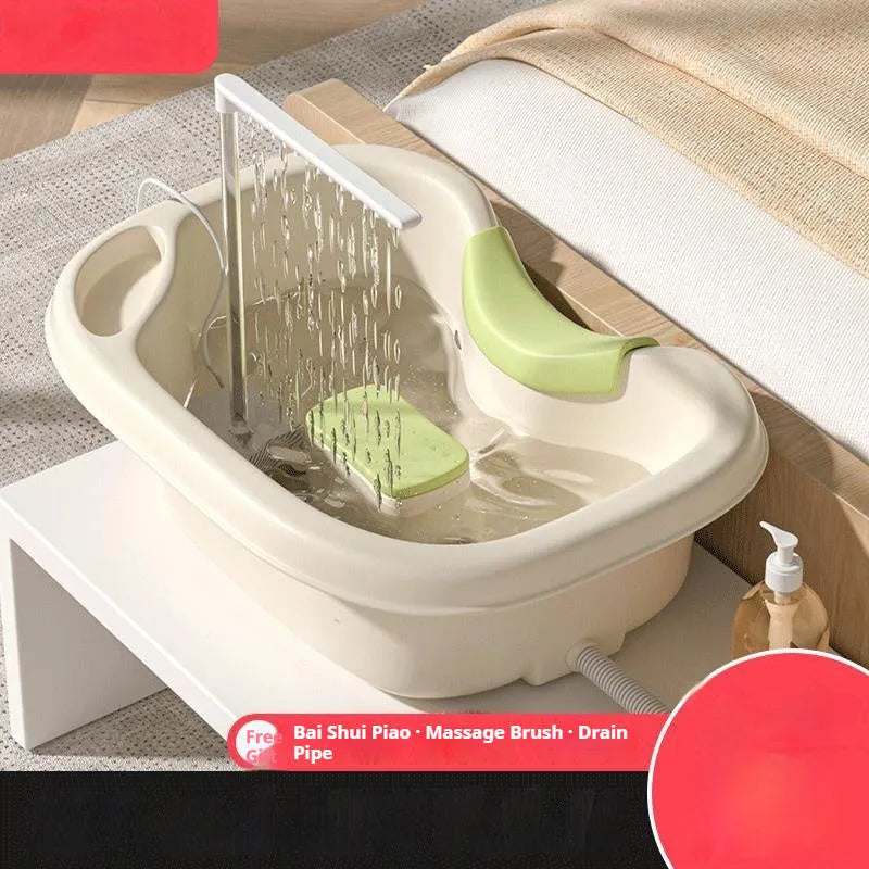 Plastic shampoo basin with neck pillow and water pump system for lying down hair washing