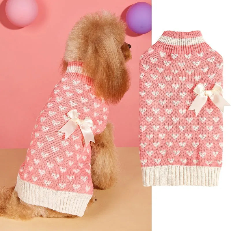 Acrylic dog sweater with decorative bow and love heart designs in red and pink colour options