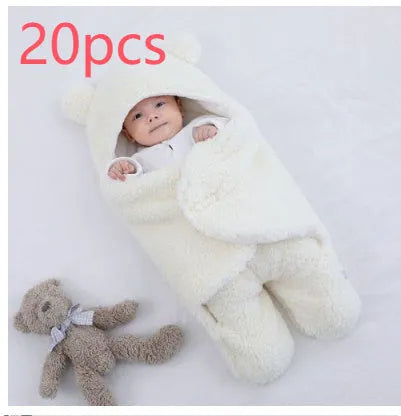Cotton blend baby quilted sleeping bag wrapper shown in light blue, with size and colour options displayed.