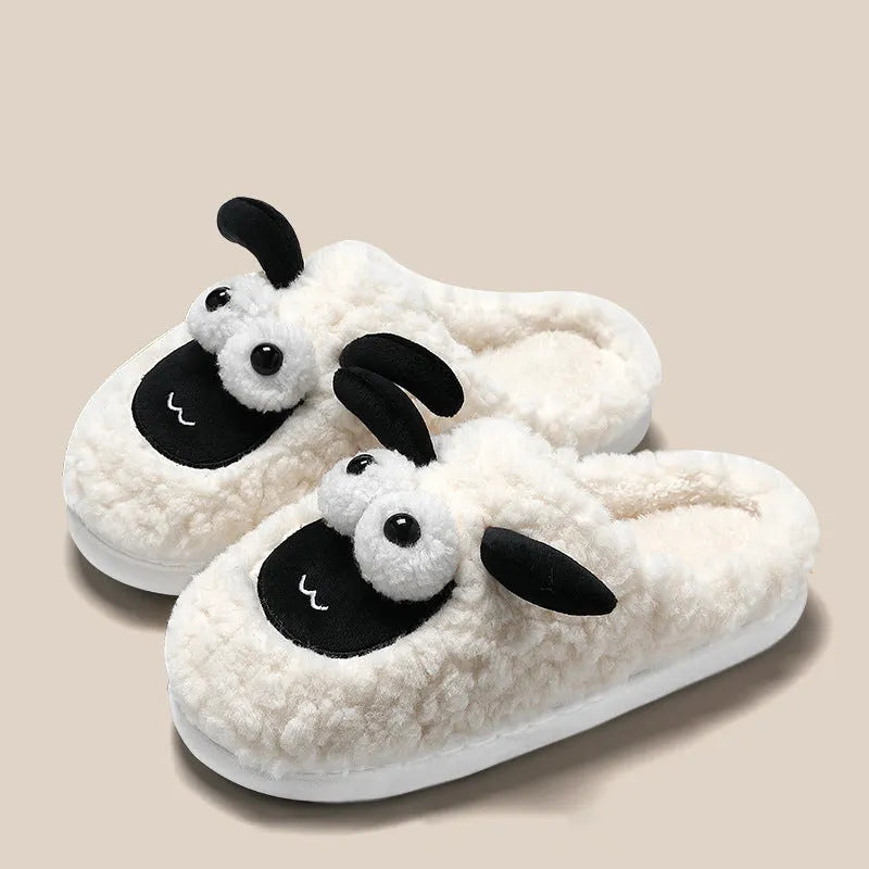 Simple lamb design thermal cotton suede slip-on slippers with a sewn PVC sole.