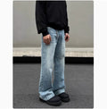 Men's blue straight leg jeans with whisker washing and visible stitching detail