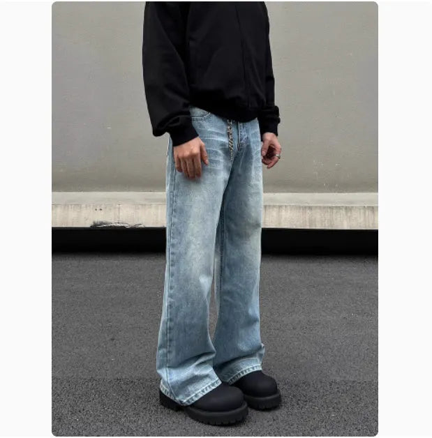 Men's blue straight leg jeans with whisker washing and visible stitching detail