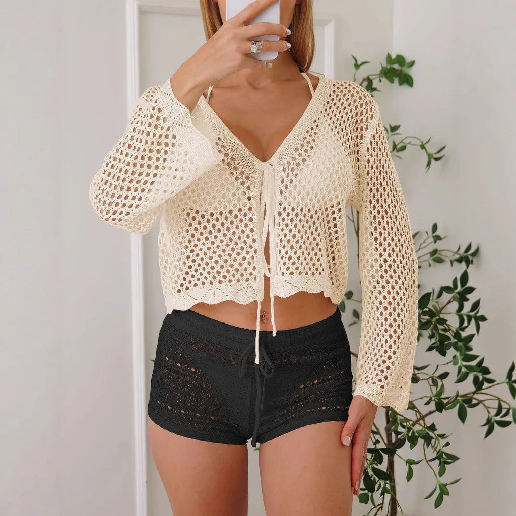 Short women's cardigan blouse with hollow woven texture and bell sleeves in apricot colour