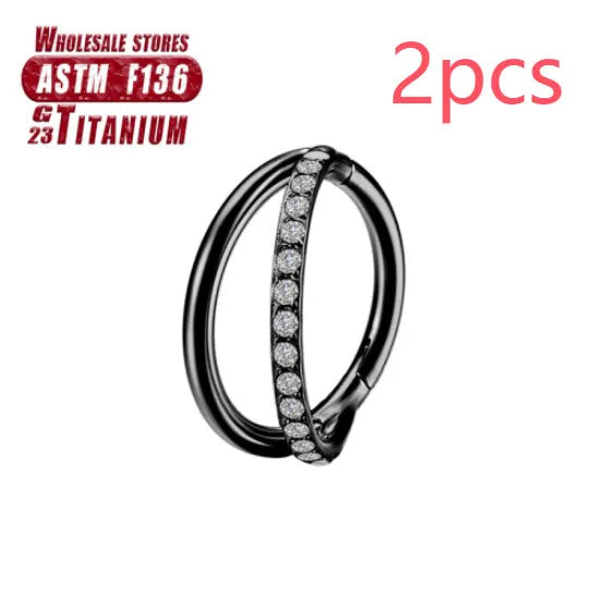 Titanium alloy fork nose ring in silver colour on a grey background