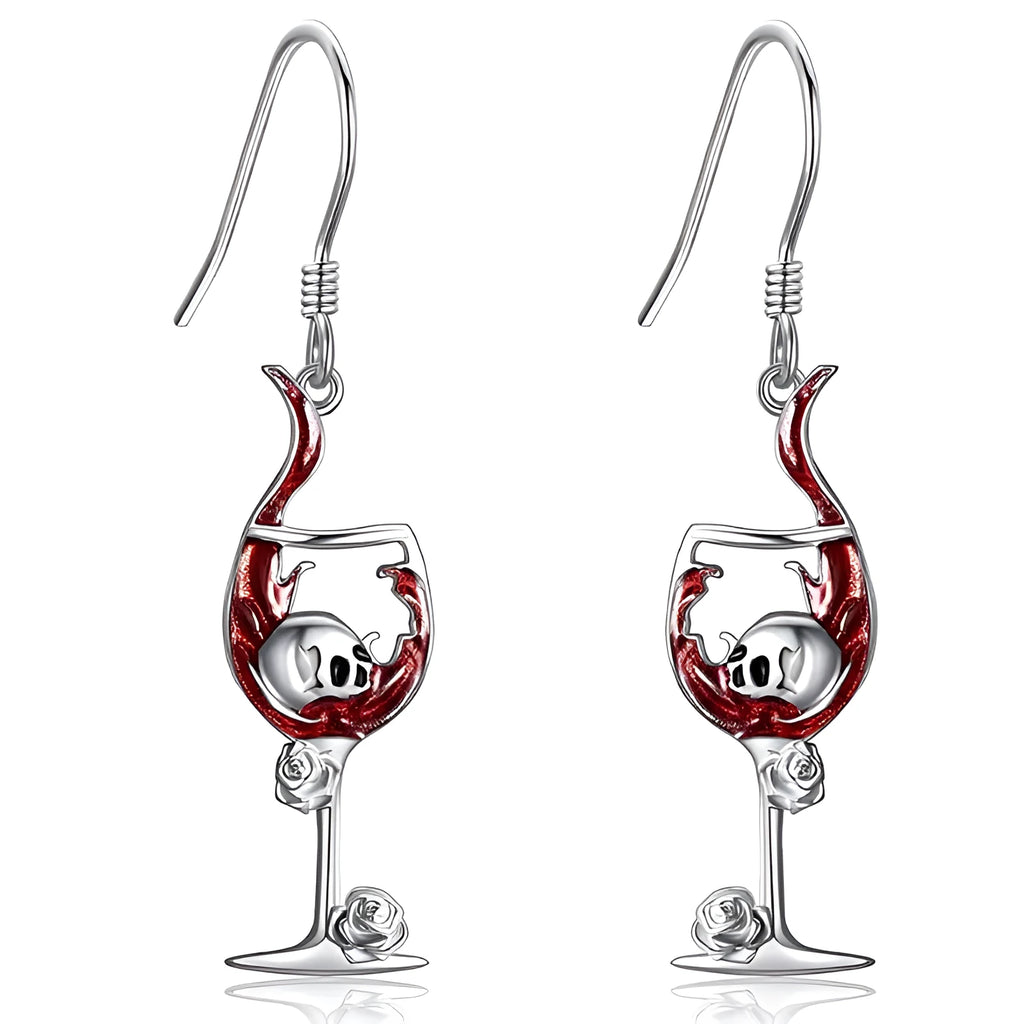 A pair of zinc alloy electroplated earrings depicting a skull inside a wine glass shape.