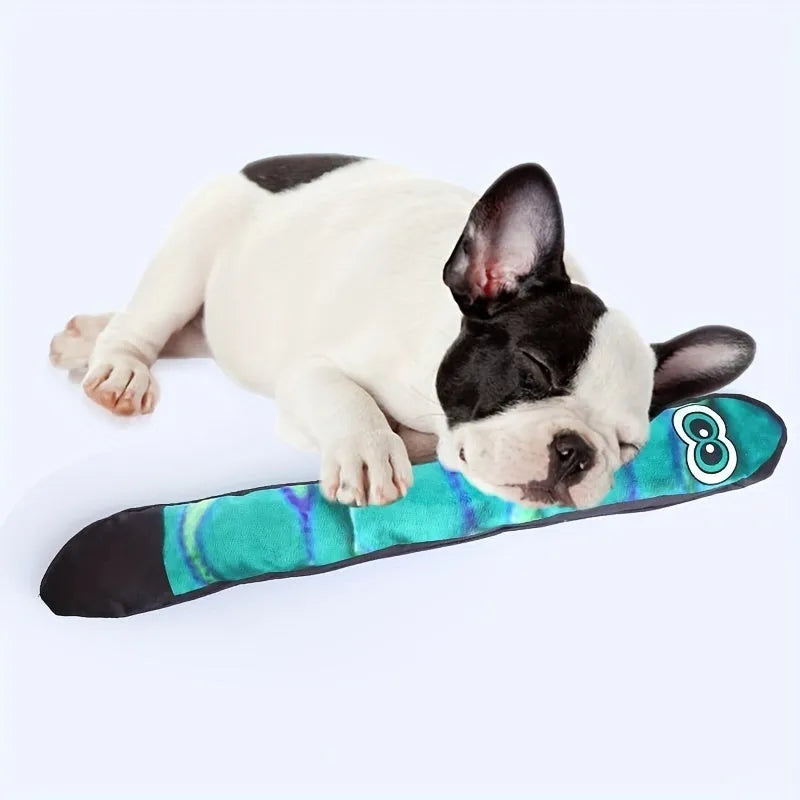 Multicolor stripe print snake plush squeaky toy for dogs on a white background.