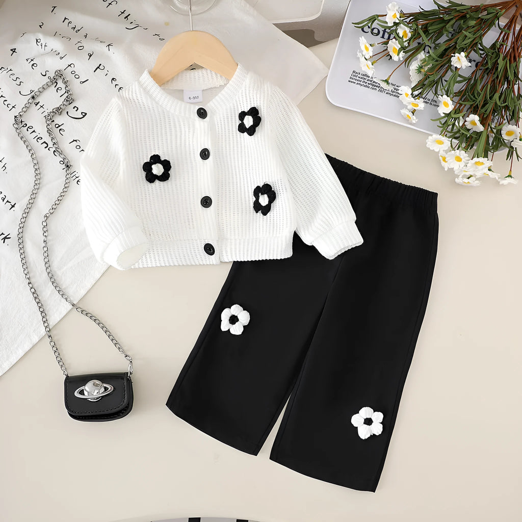 Baby girl cotton outfit set with white long-sleeved wool flower top and black trousers for toddlers 6 months to 3 years
