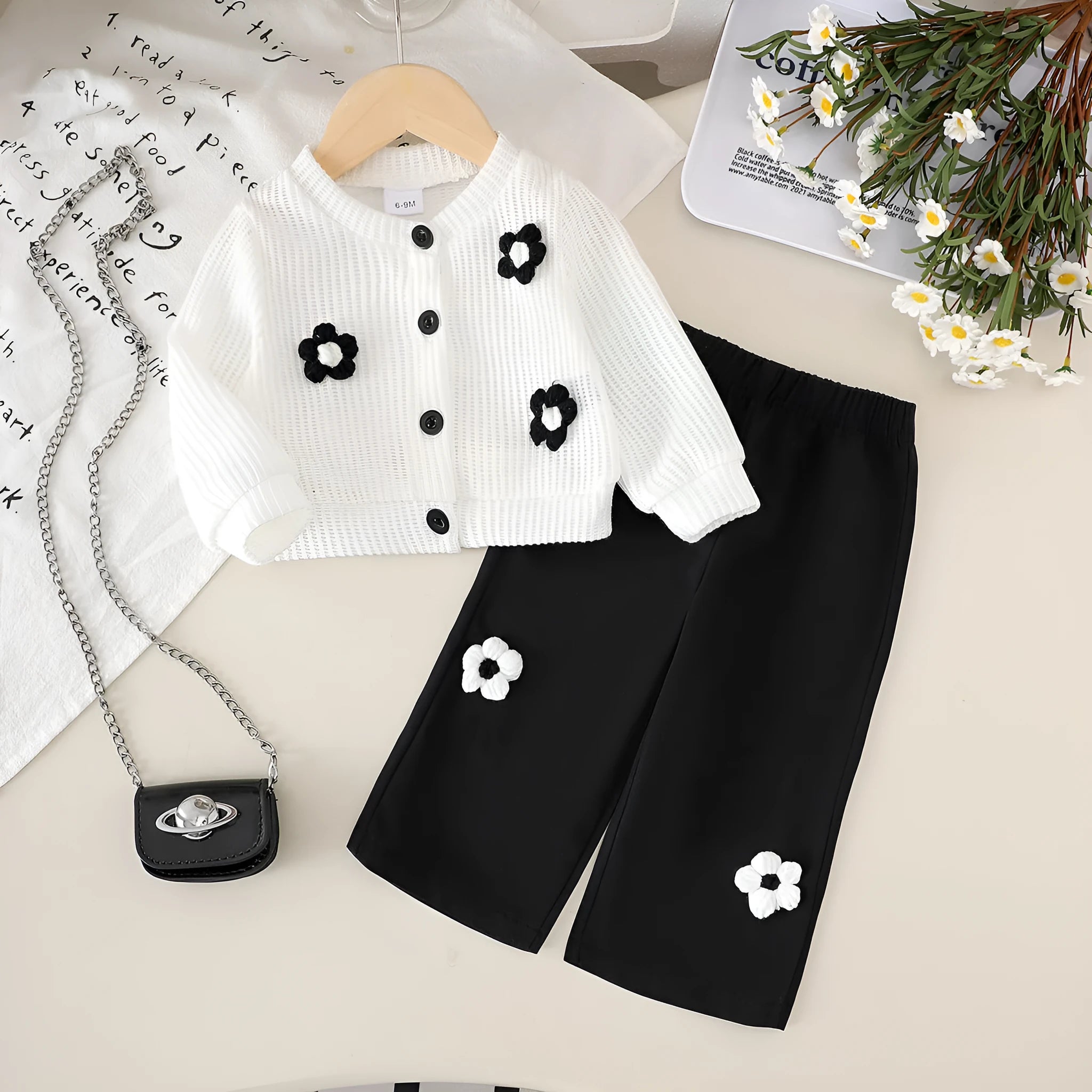 Baby girl cotton outfit set with white long-sleeved wool flower top and black trousers for toddlers 6 months to 3 years