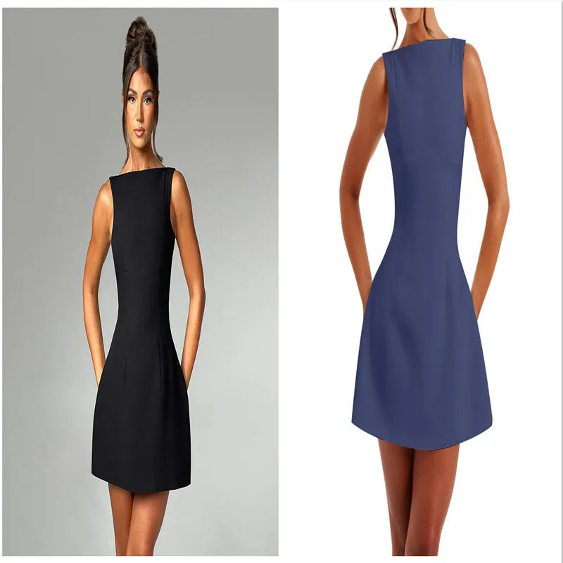 A woman wearing a black backless sling dress with a high waist and short skirt.