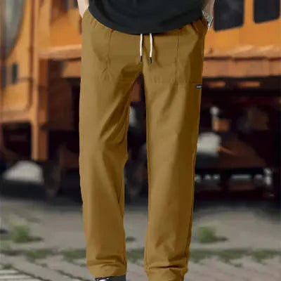 Men's light grey polyester casual trousers for spring and autumn wear.