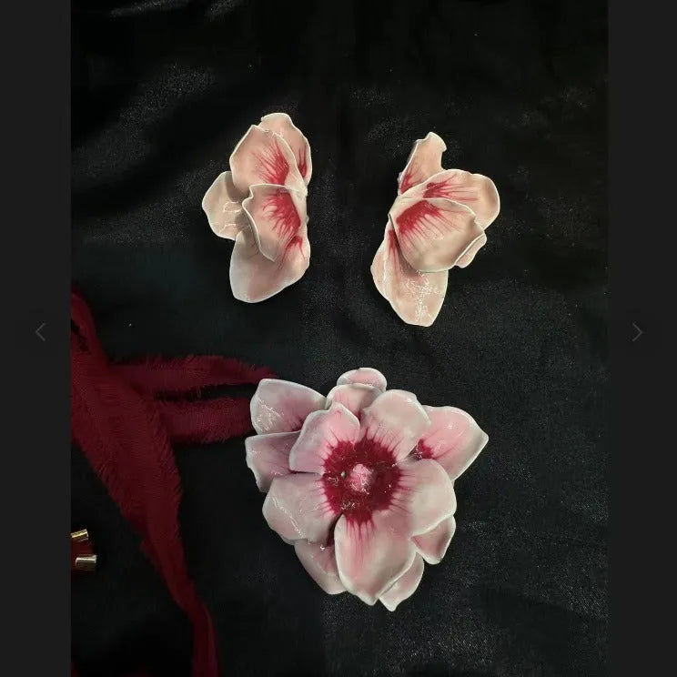 Alloy stud earrings with oil-spot glaze floral designs in pastoral style