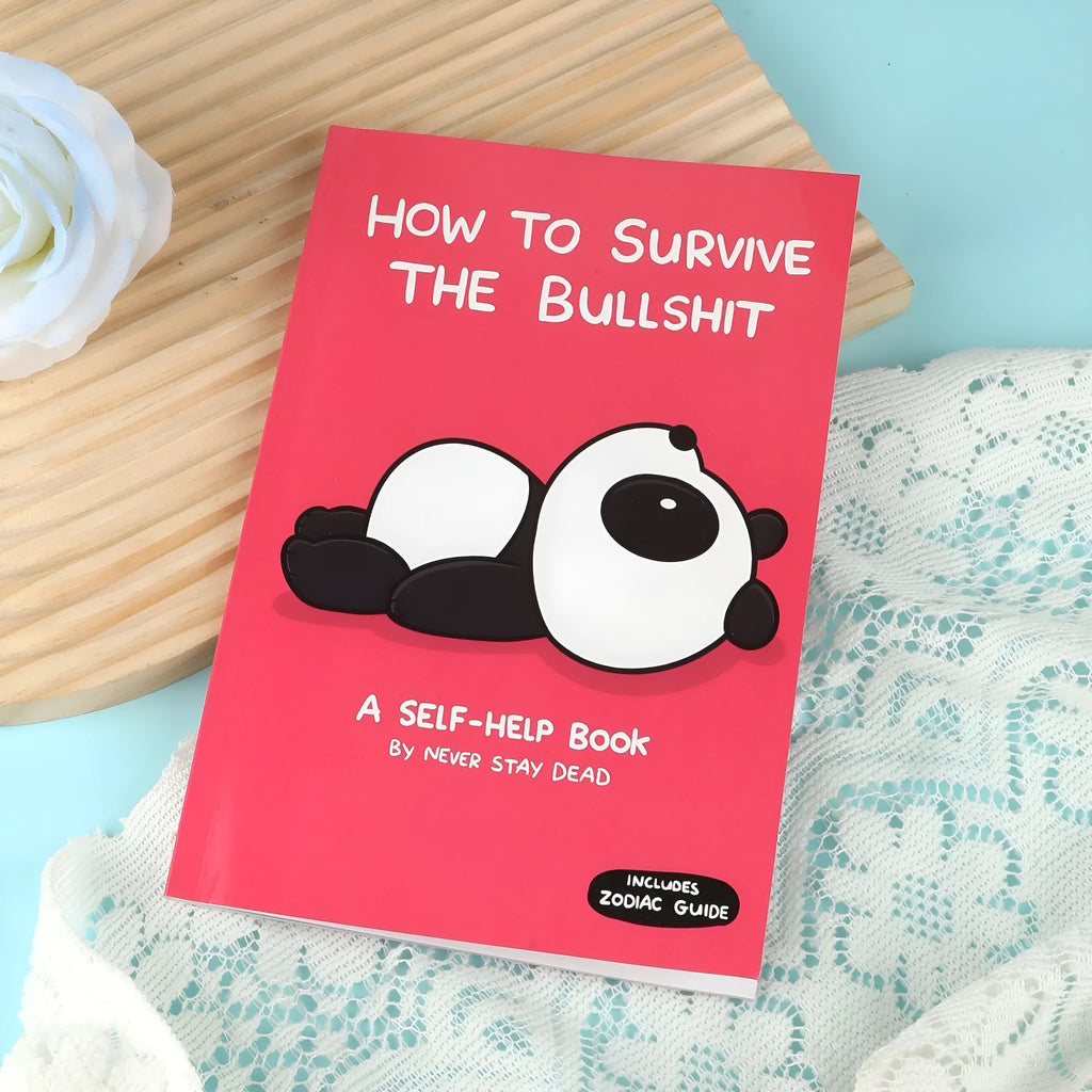 Red self-healing cartoon survival book notebook with paper cover open on a desk