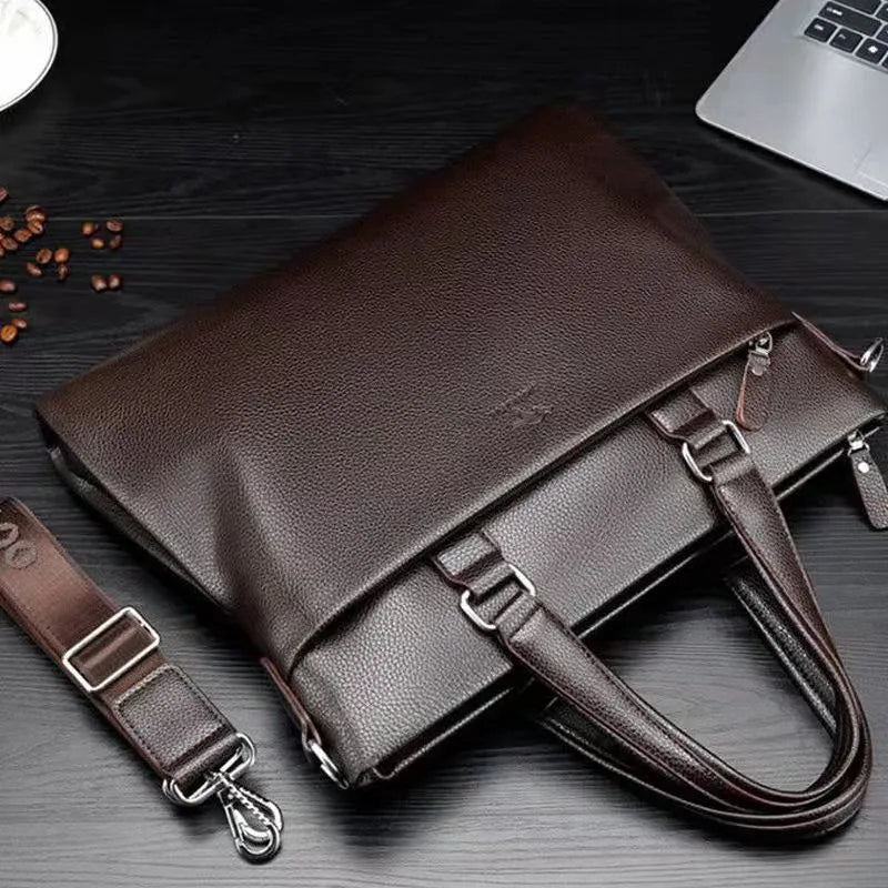 Men's black PU leather shoulder messenger bag with a splicing design detail.