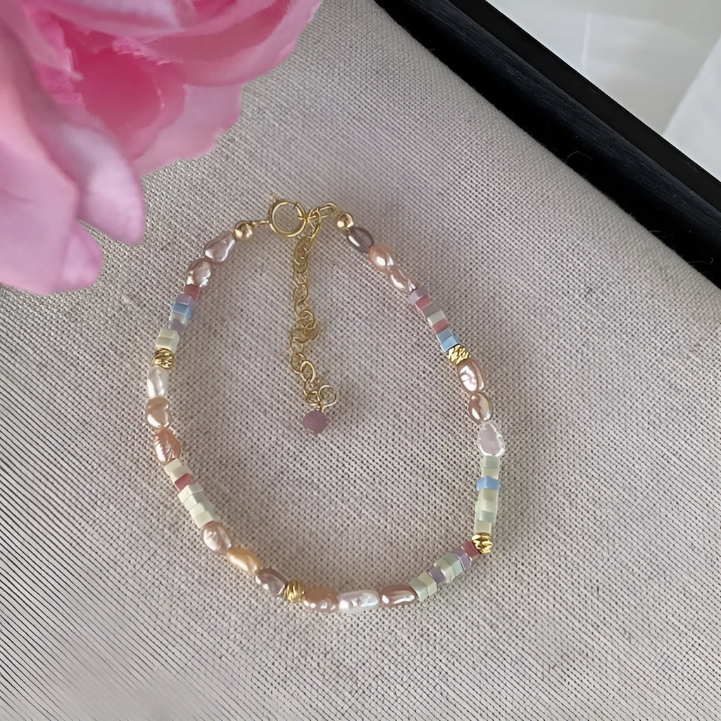 Natural pearl bracelet and necklace set with small irregular pearls and 14K gilded purple silver finish.