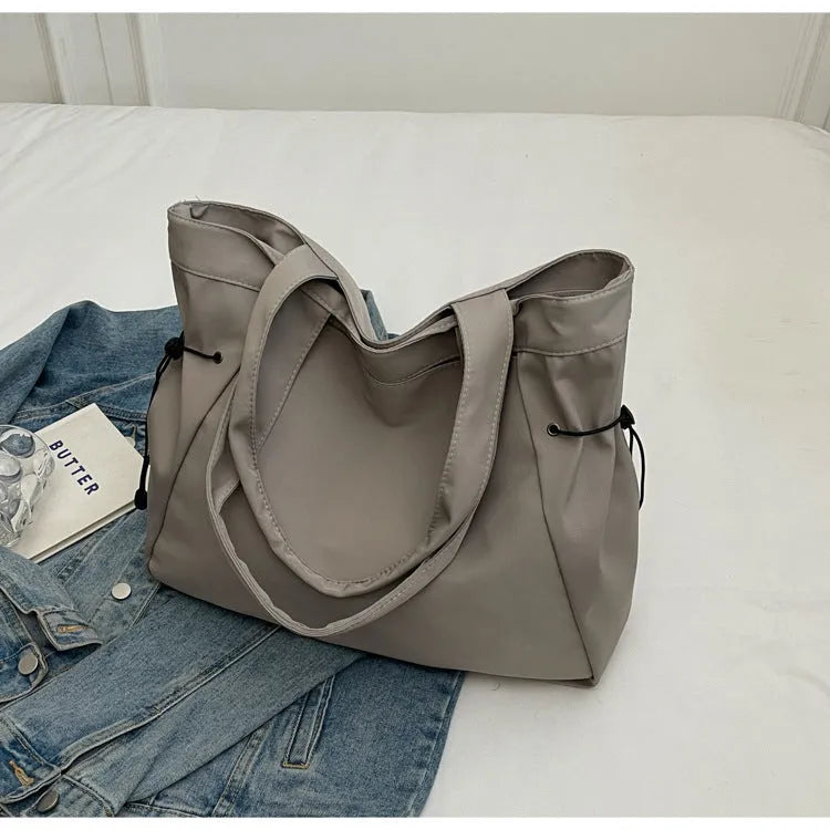 Soft foldable Oxford cloth tote bag in street trend style, shown in multiple colour options.