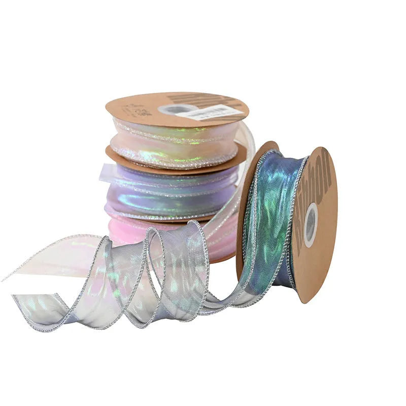 Roll of colourful mesh fishtail yarn wave ribbon with 4cm width for gift wrapping.
