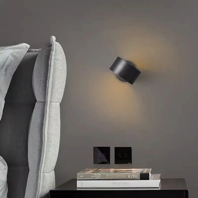 Modern copper wall lamp with choice of black or gold finish and adjustable light temperature