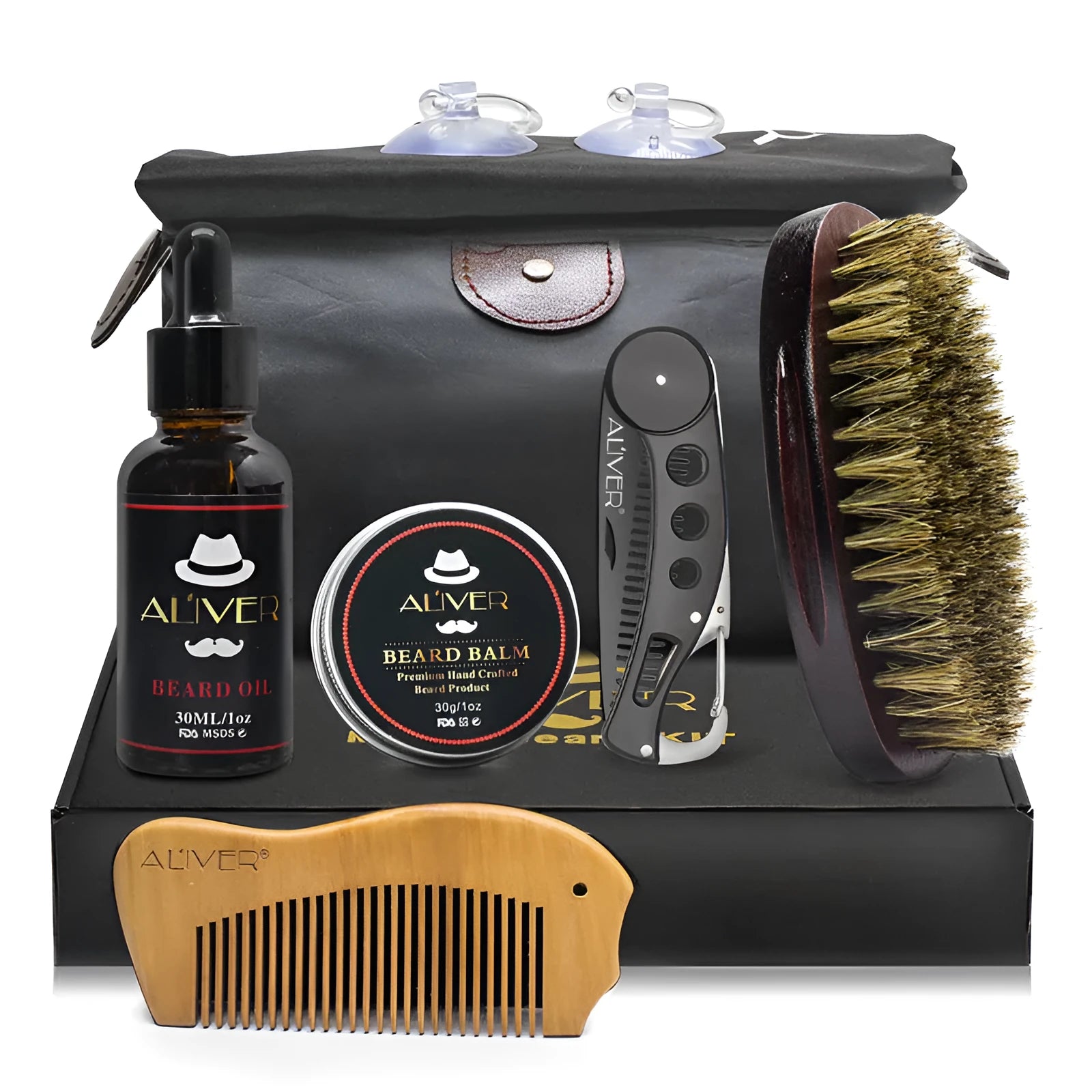 7-piece black beard grooming set with wood brush, metal comb, scissors, apron and cleaning brush on a surface