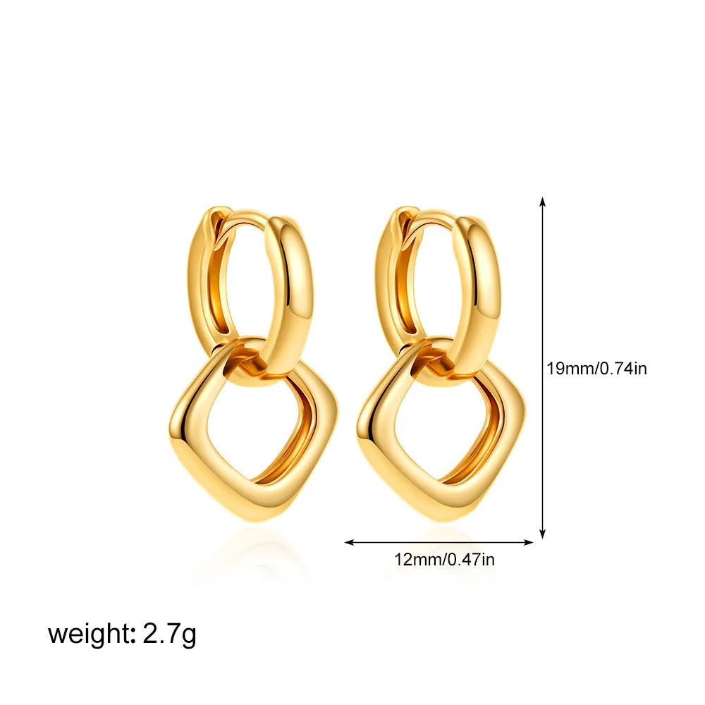 Copper geometric square double ring twist ear clip earrings on display