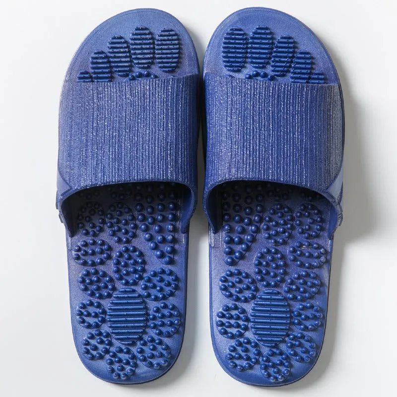 Reflexology acupressure slippers in EVA material with 3D massage particles, available in blue, grey, light blue, pink, purple