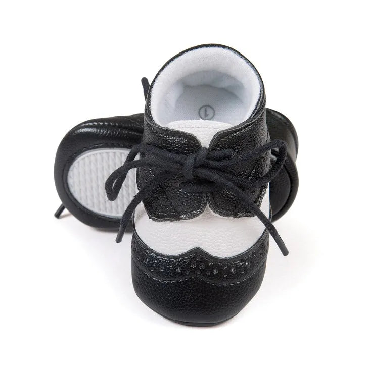 Men's vintage-style baby walking shoes in synthetic leather, shown in light brown colour.
