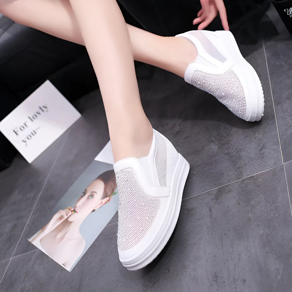 Women's wedge slip-on shoes in black with mesh upper and round toe