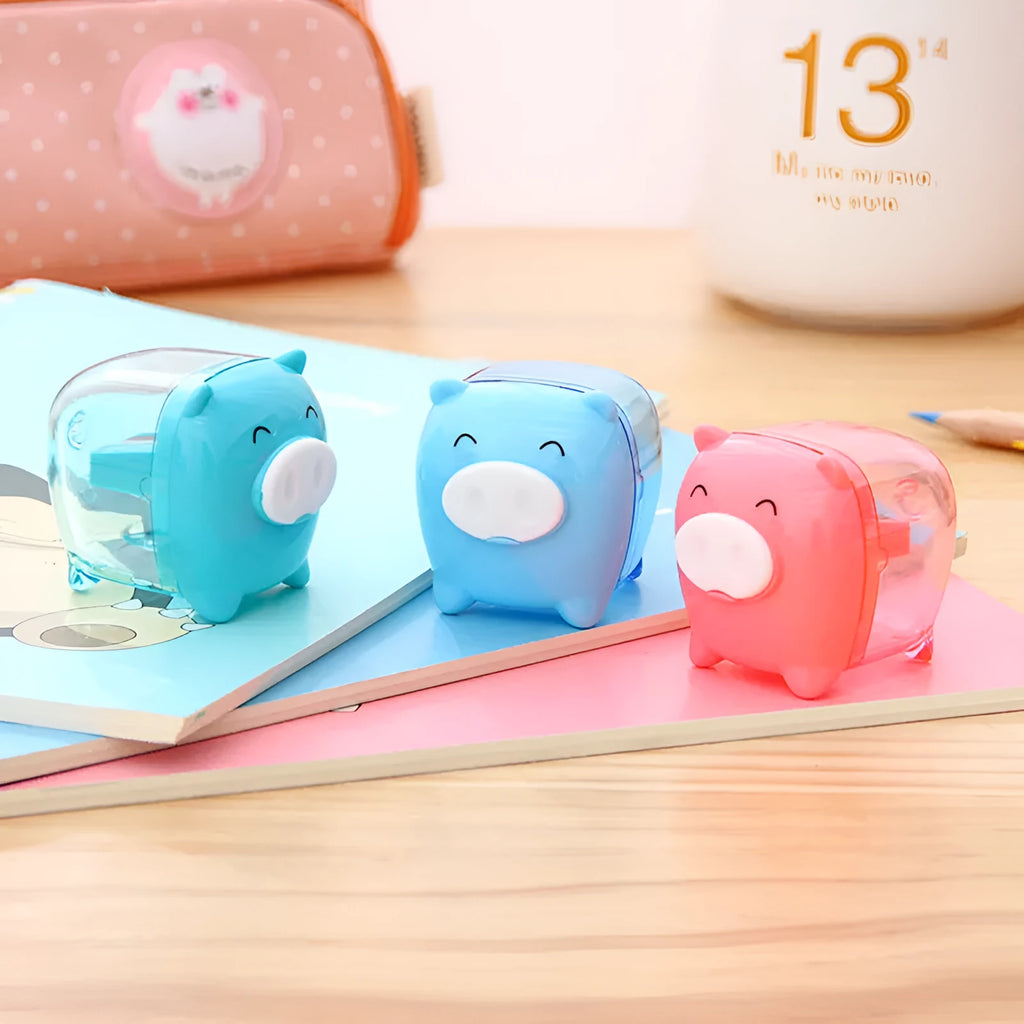 Deli 0557 manual pencil sharpener, plastic animal-shaped body, mixed colour, 48x38.2x41mm