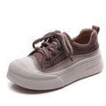 Women's yellow and cameo brown round-toe lace-up casual shoes with cow leather uppers.