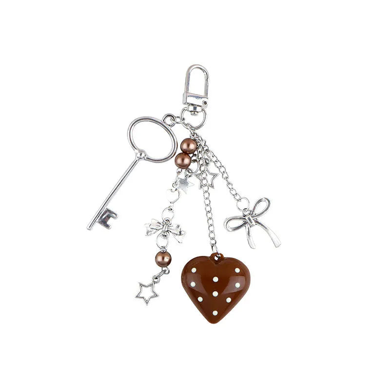 Retro zinc alloy key ring with bow and love heart chain design in multiple colour options