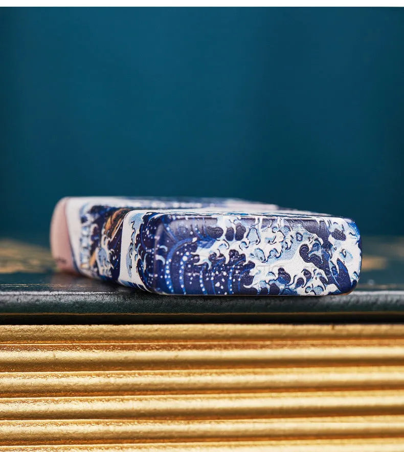 Coloured lacquer windproof lighter with Kanagawa surf design, steel inner liner, copper housing