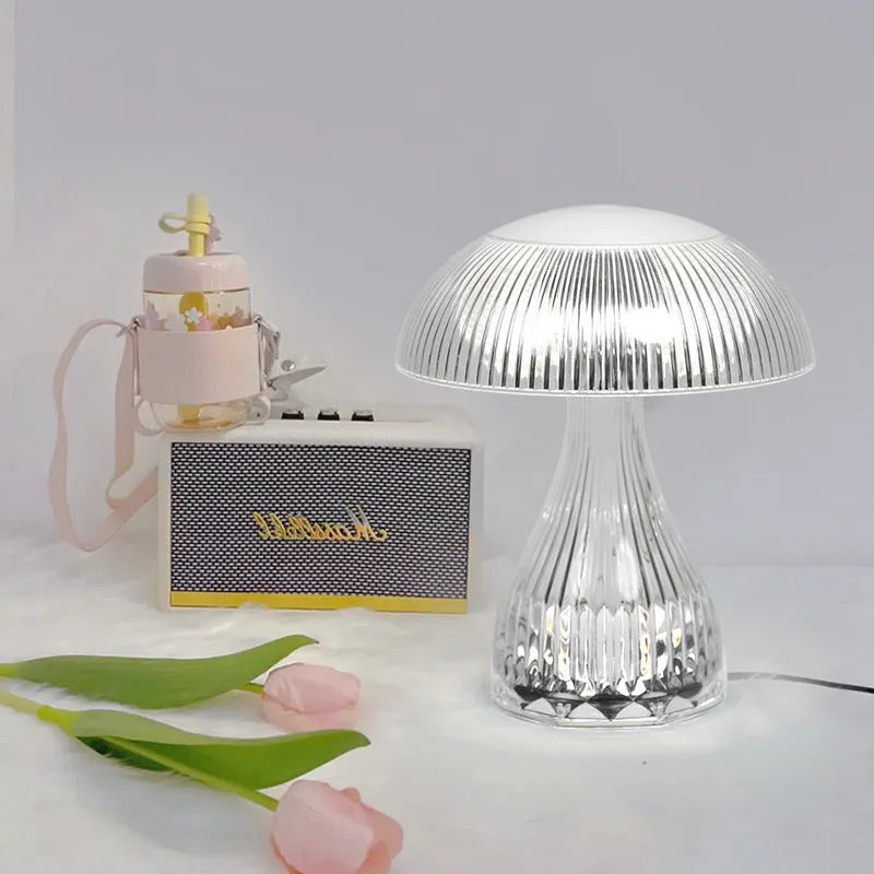 White touch control USB rechargeable night lamp with acrylic light body on a table.