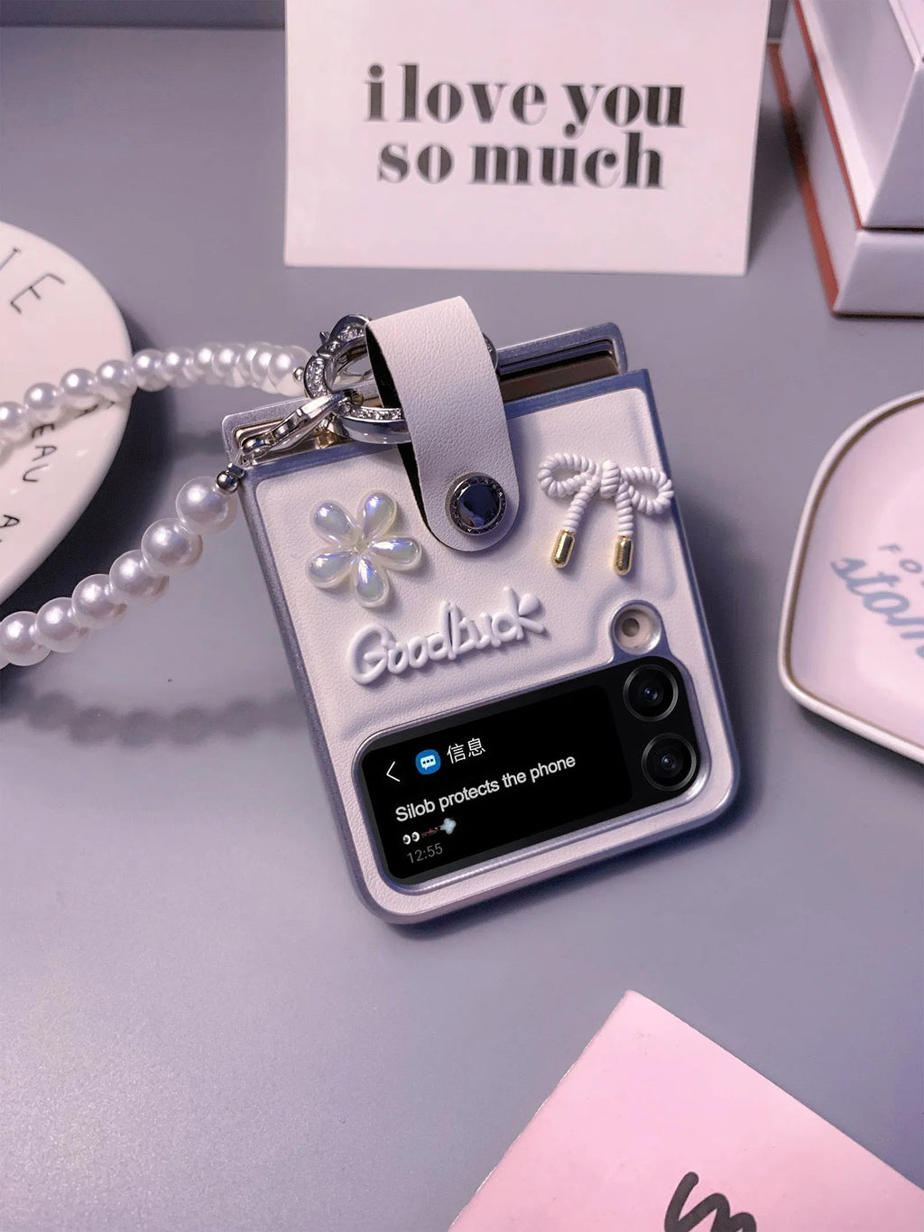 Ultra thin faux leather folding phone case for Samsung Galaxy Z Flip with white silver border, flower bow and bracelet