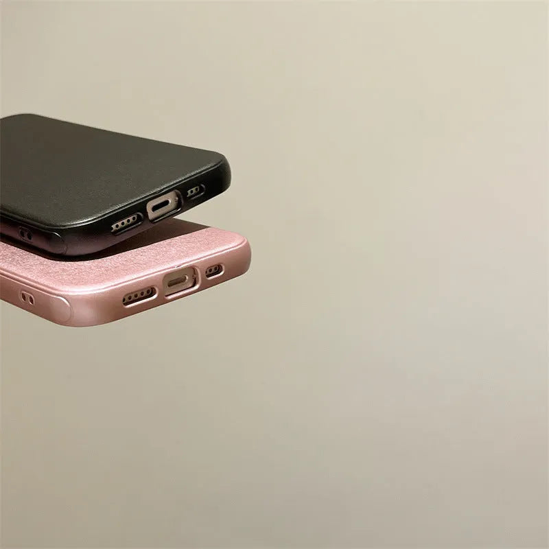 Imitation leather phone case for iPhone 15 Pro Max in solid black colour with embossed texture and protective edge