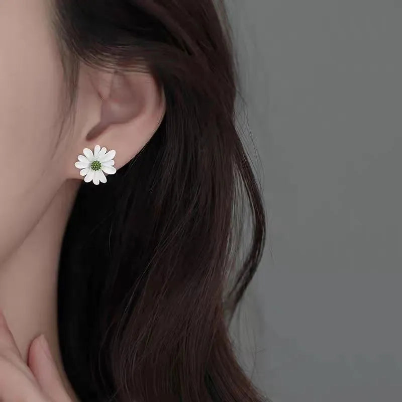 Little Summer alloy flower stud earrings in blue and orange, white and green, and yellow and white colour options.