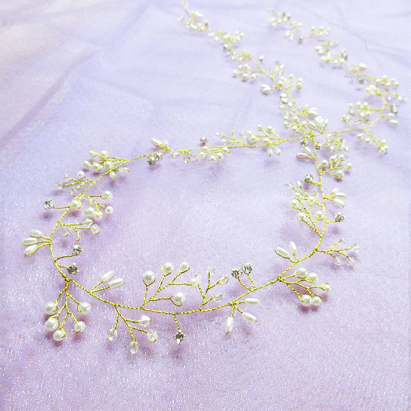 Gold metallic long hair band for brides with pearls, shown coiled.