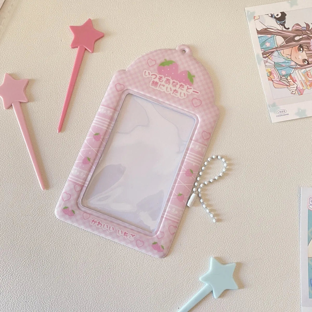 Plaid strawberry cartoon design PVC card holder measuring 7.6 by 13.6 centimetres.