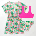 Girls' floral two-piece swimsuit in polyester on a white background, showing briefs style.