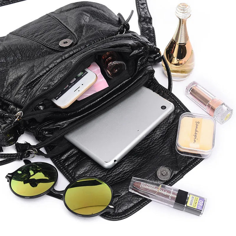 REPRCLA women's black crossbody messenger bag in soft PU leather, 25cm x 22cm x 3cm, two-layer design