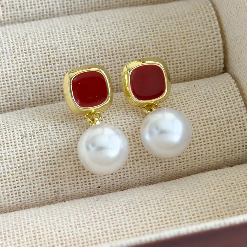 Women's copper matte geometric square round stud earrings in gold silver colour on neutral background
