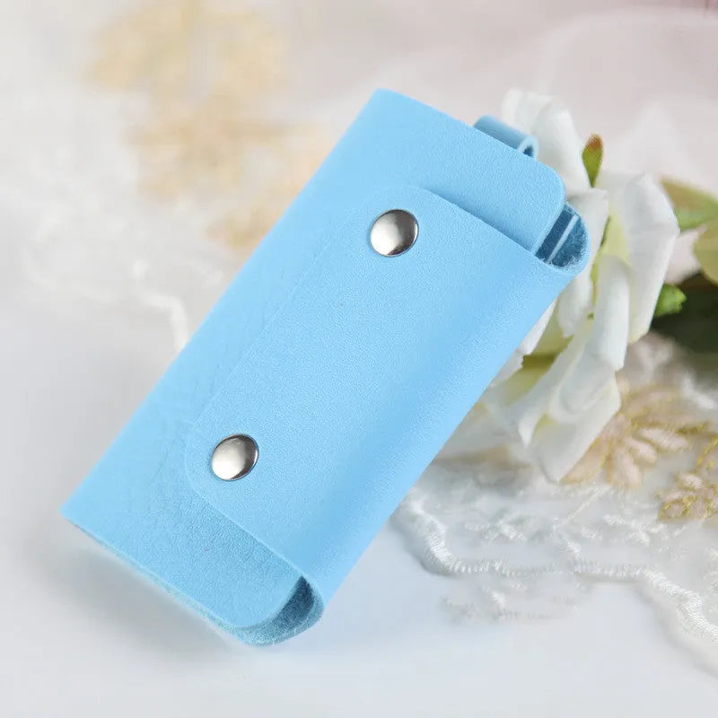 Colourful button closure PU leather key case in square vertical shape with soft plain finish