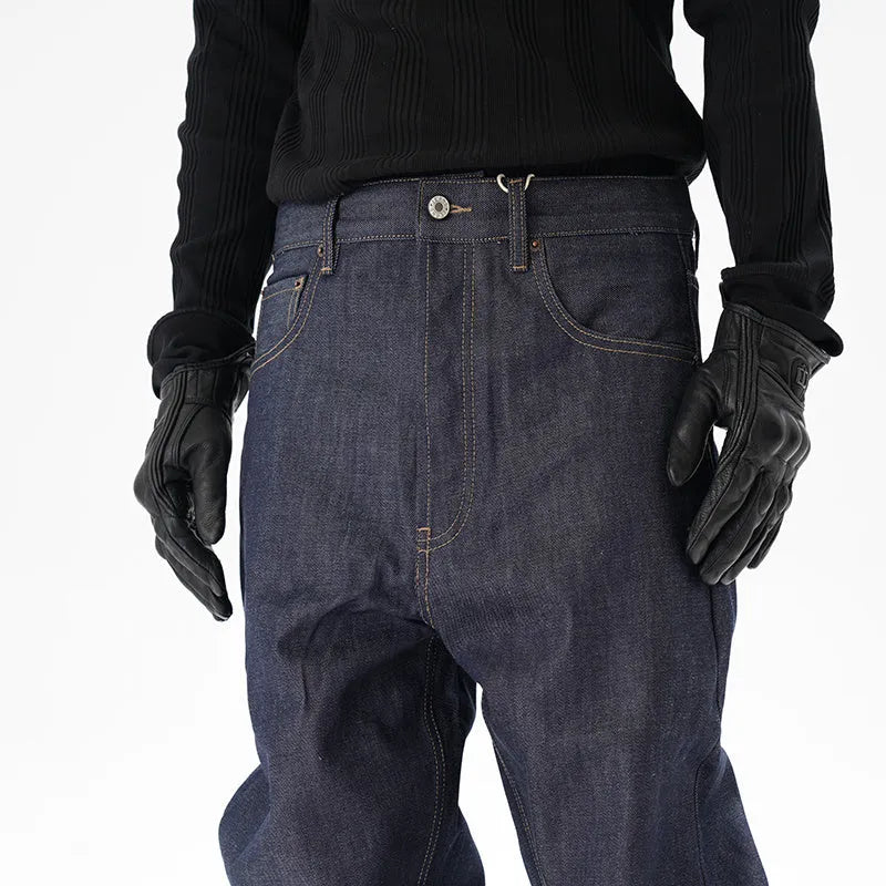 Man's dark blue loose straight-leg casual jeans on a white background.