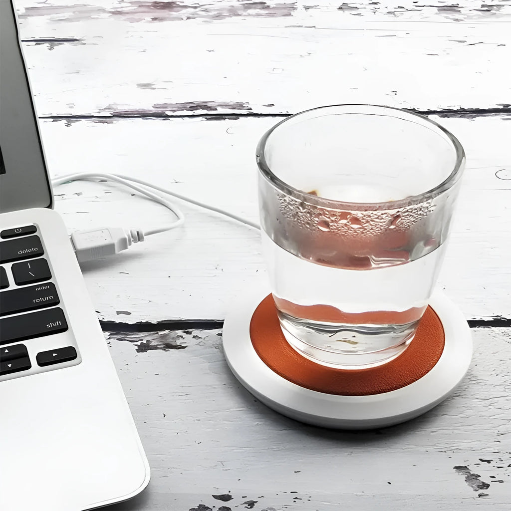USB-powered heating coaster in black, blue, or orange PU leather for desk drink warming