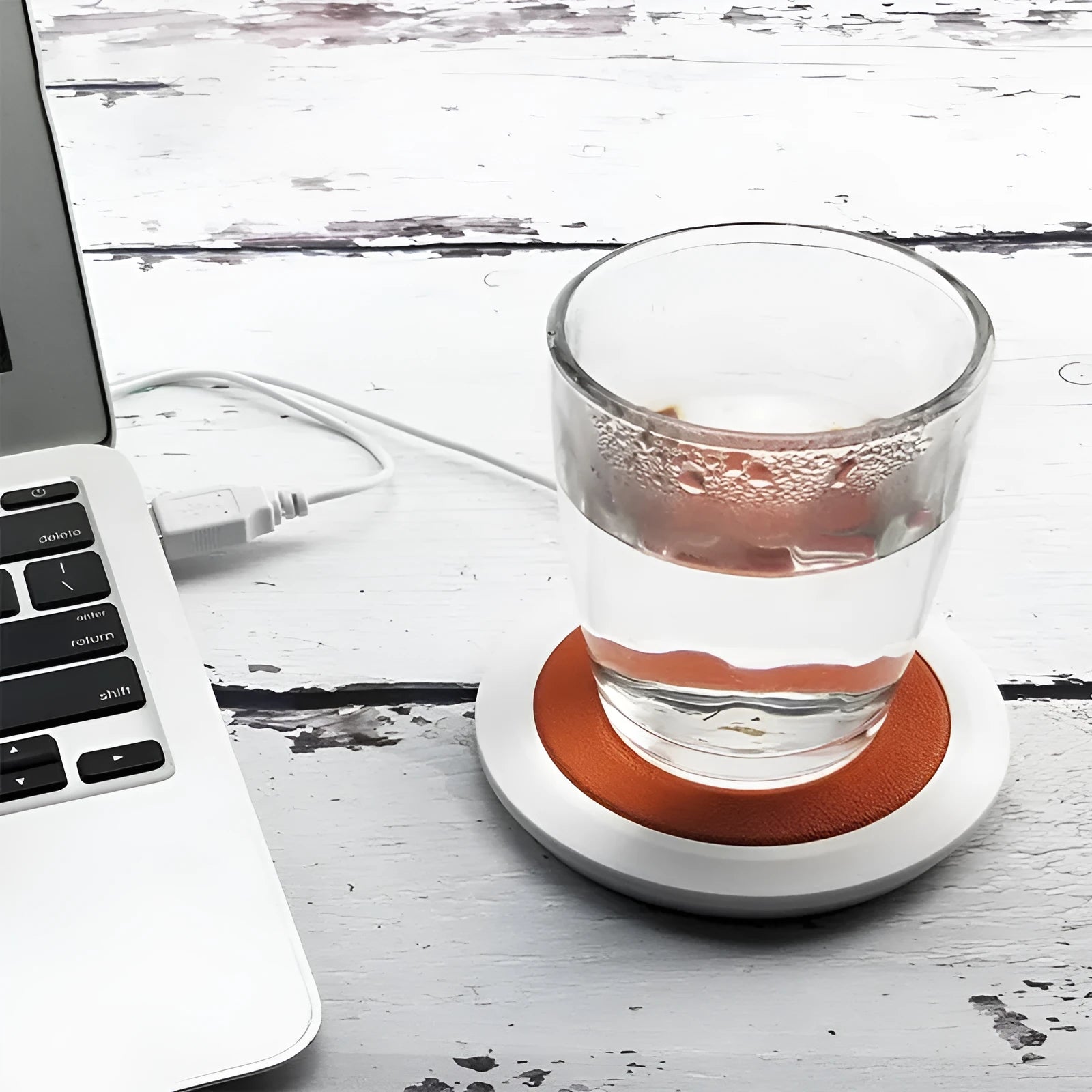 USB-powered heating coaster in black, blue, or orange PU leather for desk drink warming