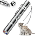 Silver aluminium cat toy pointer wand with USB charging showing laser patterns on wall
