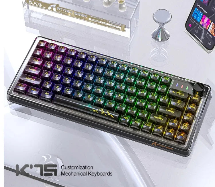 Attack Shark K75 RGB wireless mechanical keyboard with transparent black case showing RGB lighting and compact 75% layout
