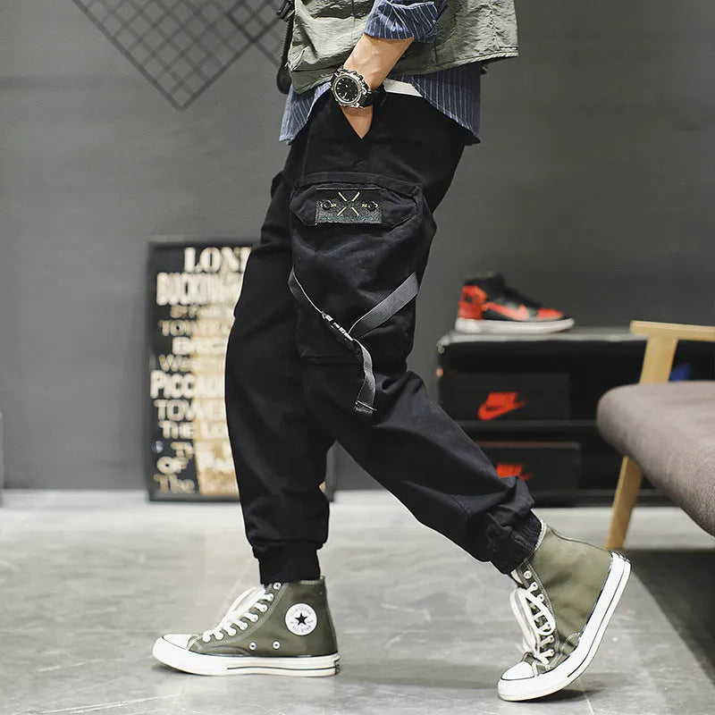 Men's cotton cargo pants in black, grey, and khaki, casual multi-pocket trousers with size chart.